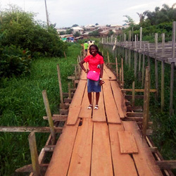 A long wooden bridge in Odo-Ota, Nigeria - Aanuoluwapo Odedere