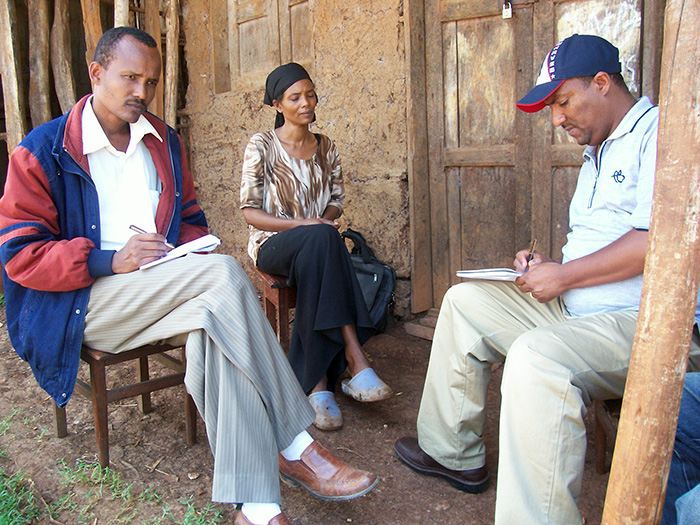 Abdusemed Mussa conducting a monitoring visit at a rural household in Southern Ethiopia